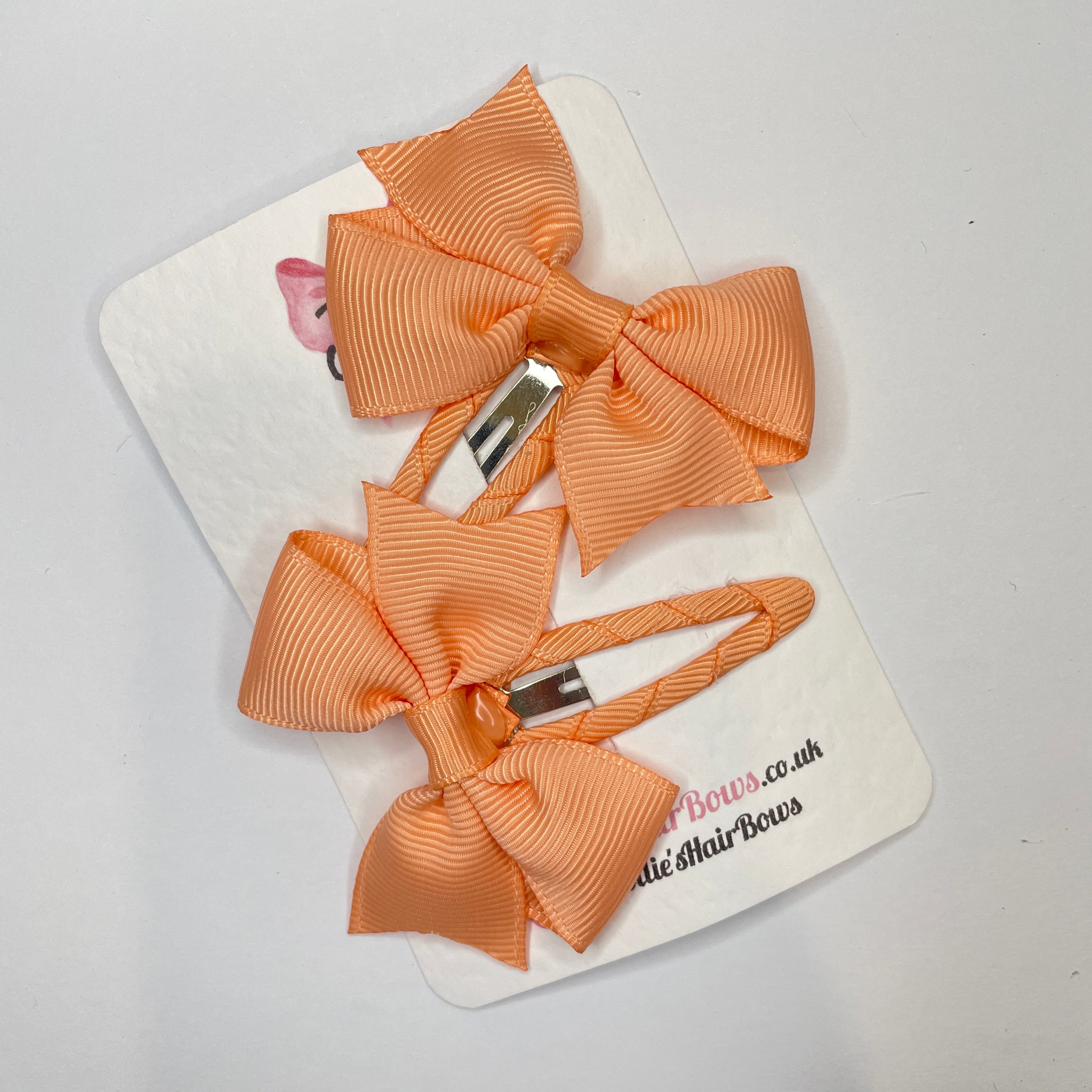 2.5" Peach Bow Snap Clips β Grosgrain Ribbon Hair Clips for Girls (Set of 2)